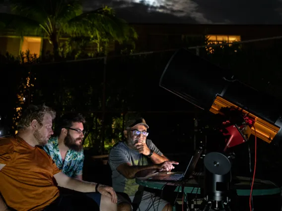 Photo of UArizona researchers observe the separation of the OSIRIS-REx sample return capsule from the spacecraft 