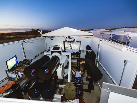 Photo of student researchers at the Space Domain Awareness Observatory at Biosphere 2.