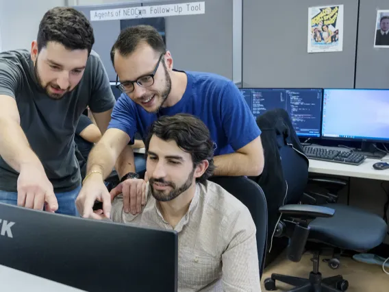 Photo of students working in a computer lab.