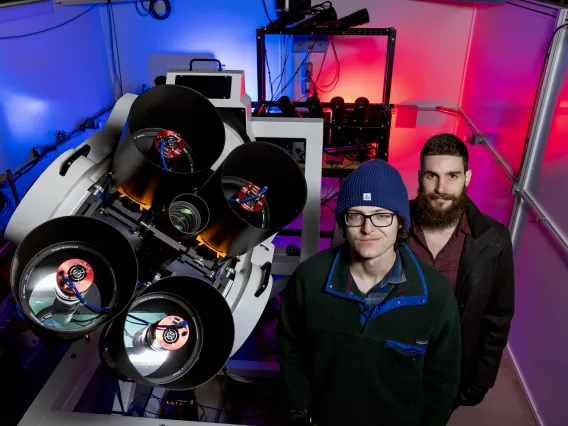 Photo of students in an observatory.