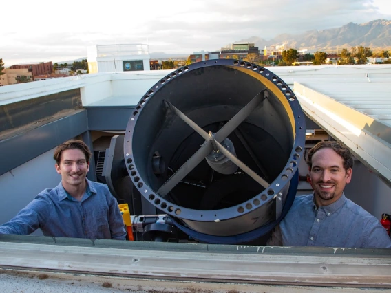 Photo of David Cantillo and Adam Battle with the RAPTORS telescope