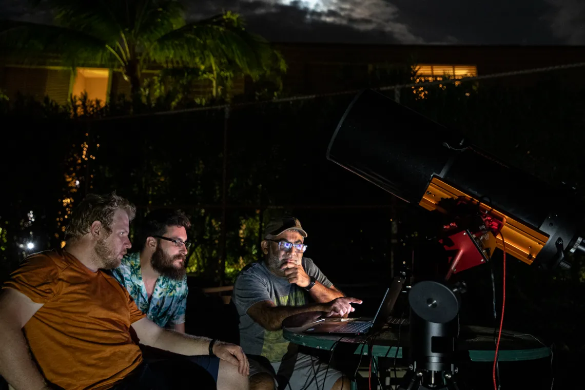 Photo of UArizona researchers observe the separation of the OSIRIS-REx sample return capsule from the spacecraft 