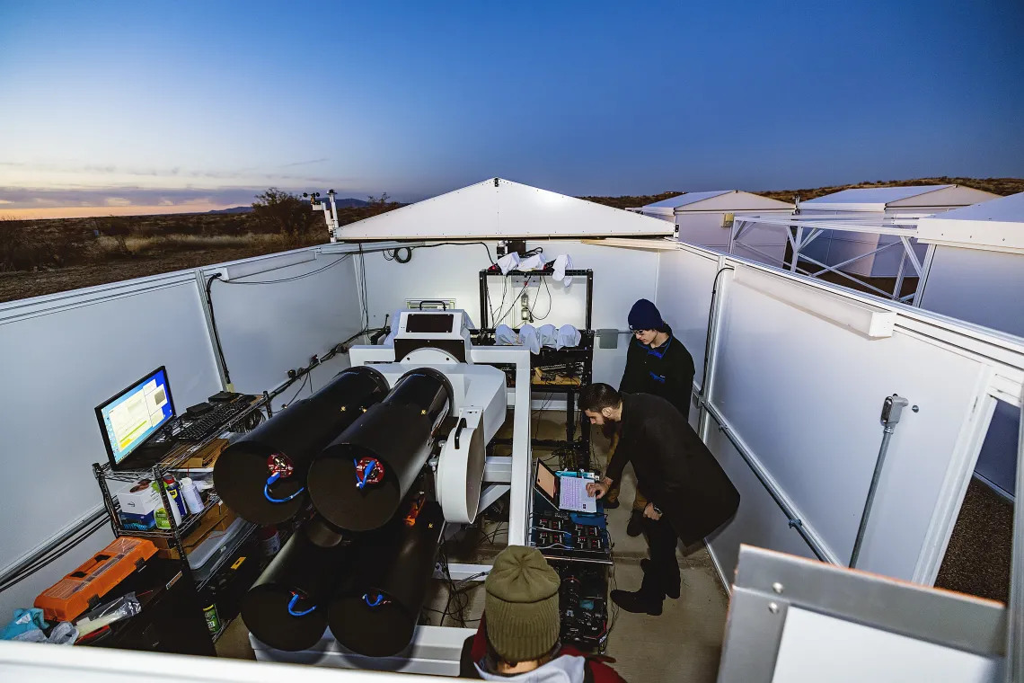 A photo of students working in the Space Domain Awareness Observatory.