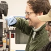 Photo of Adam Battle and Vishnu Reddy in the lab.